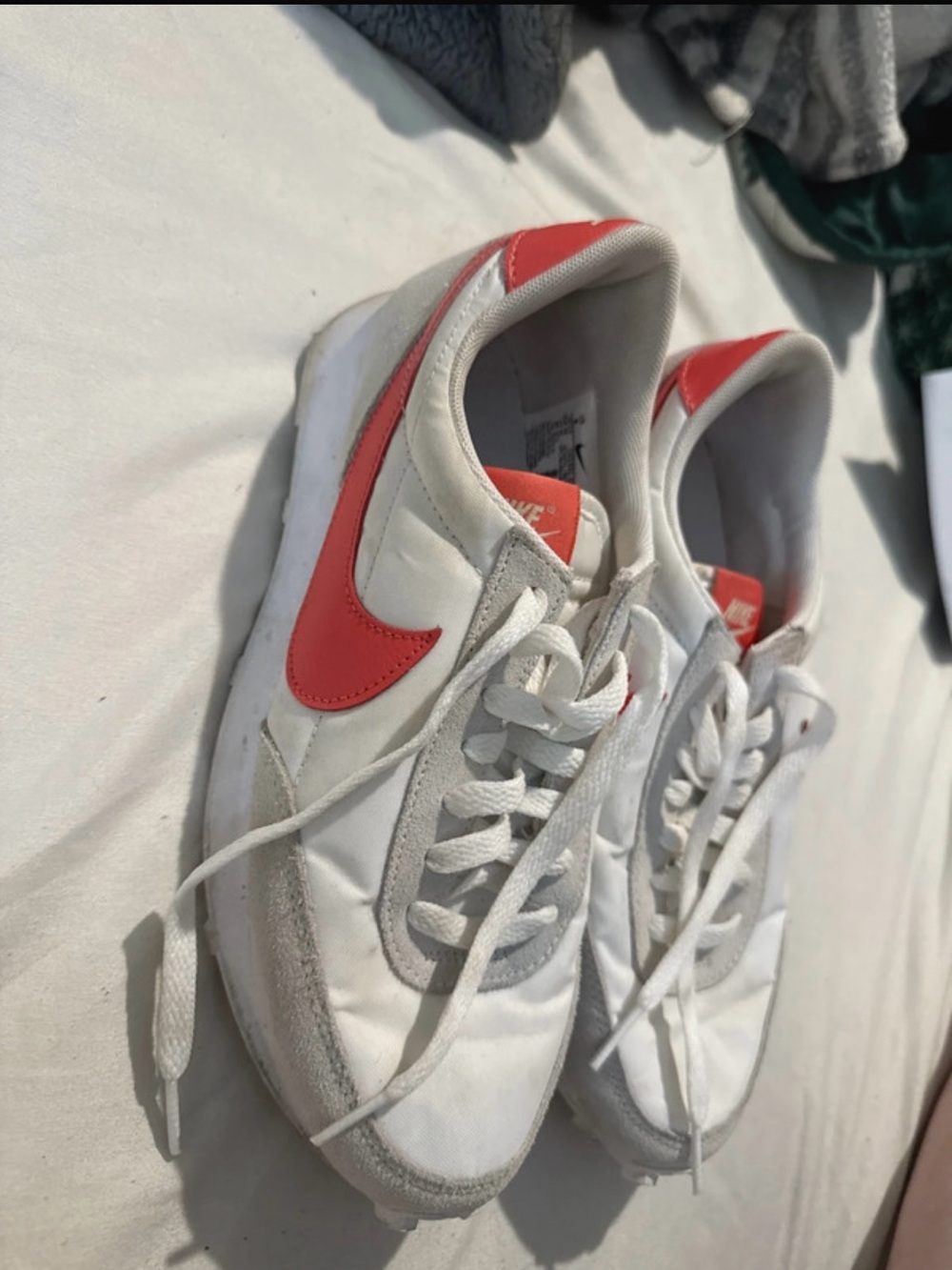 Nike White Sneakers with Coral Swoosh